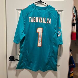 Autographed Miami dolphins nike official Tua aqua football jersey- Size Large